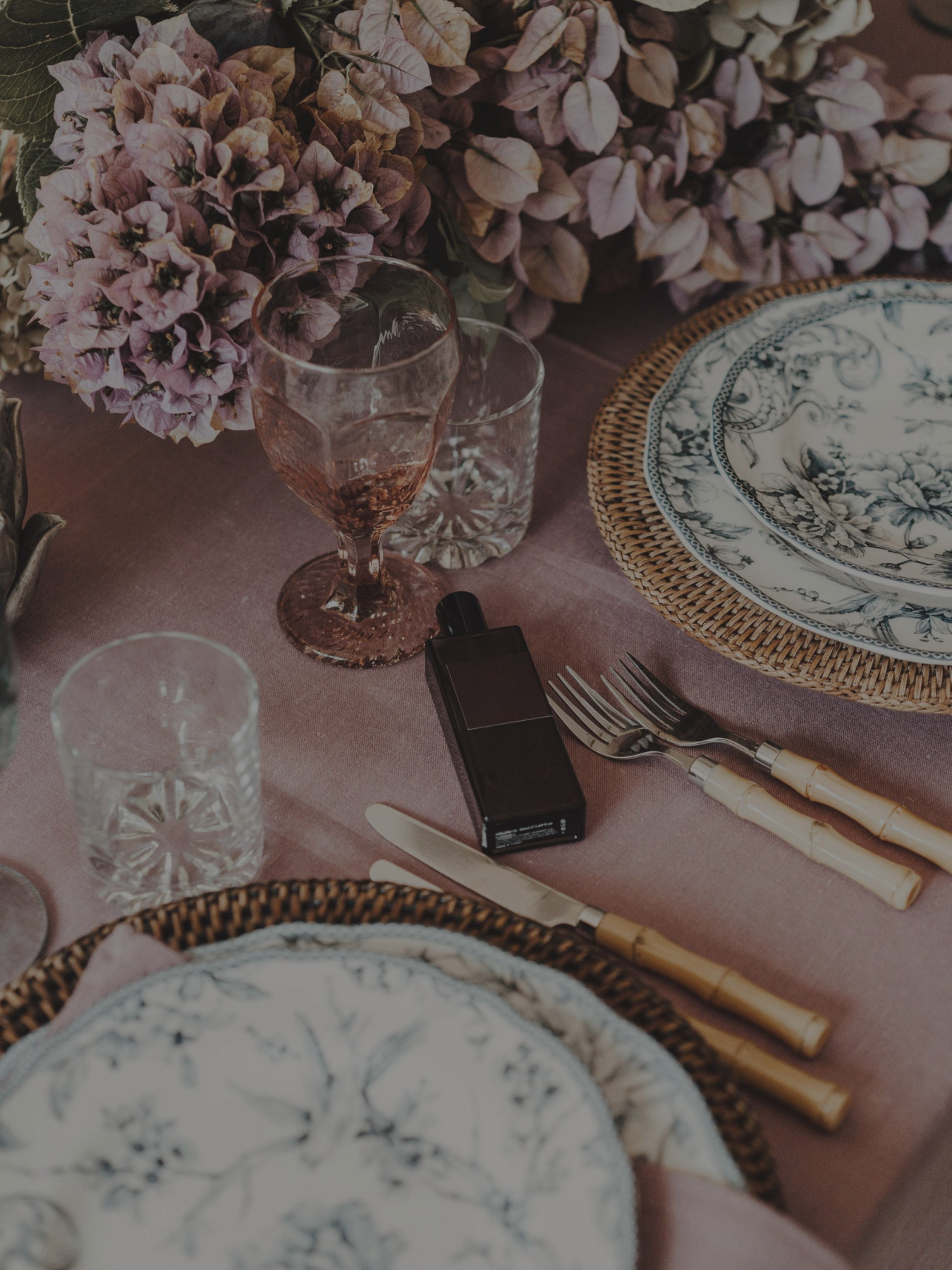 Editorial vintage dining pieces with botanical and textured accents